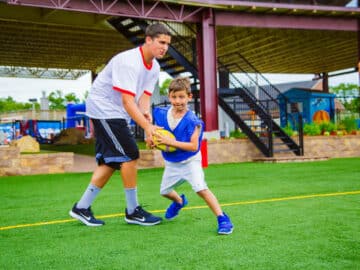 Camper playing football.