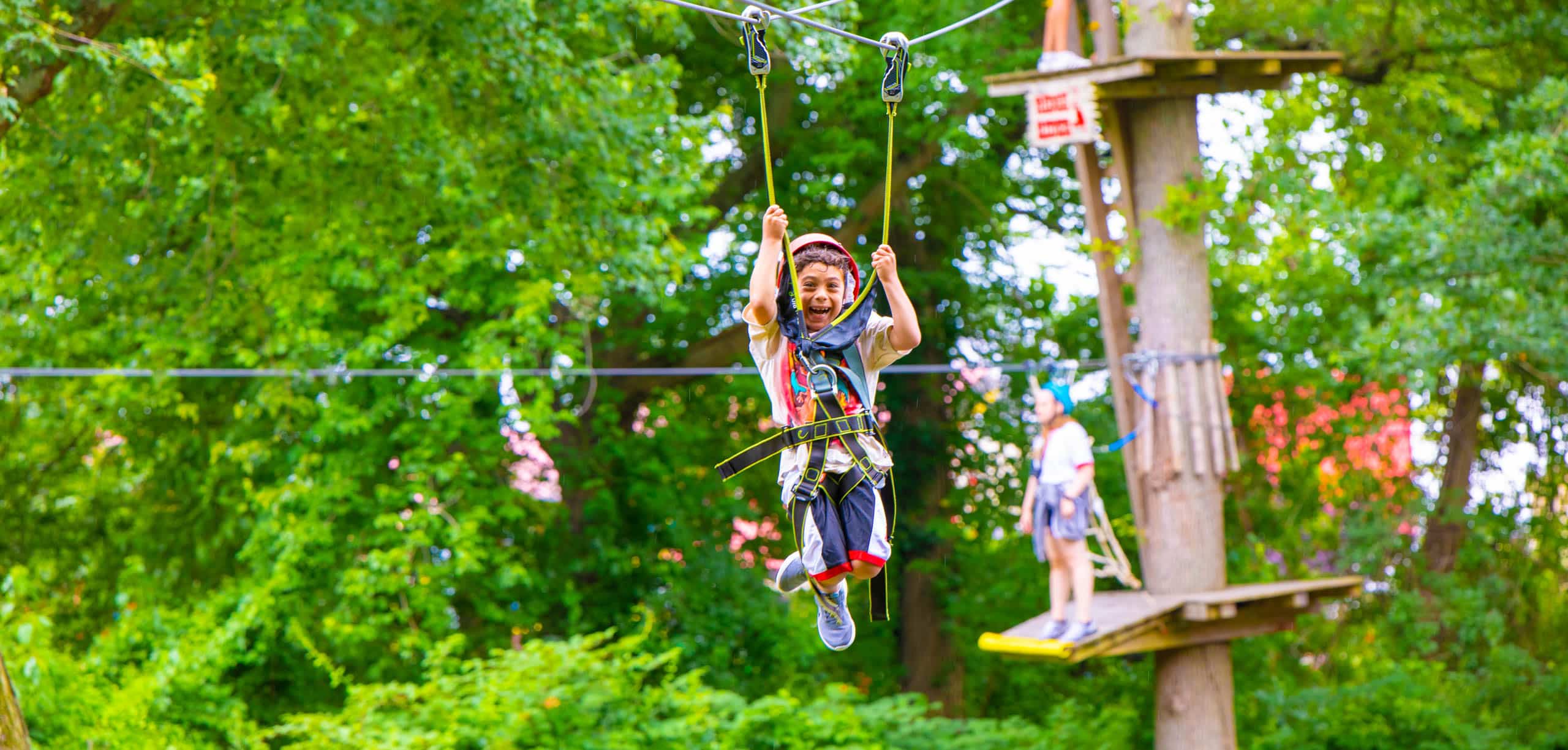 Boy having fun on the zip line.