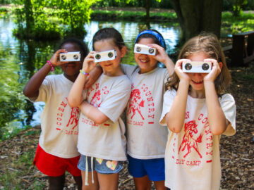 Four campers with DIY binoculars.