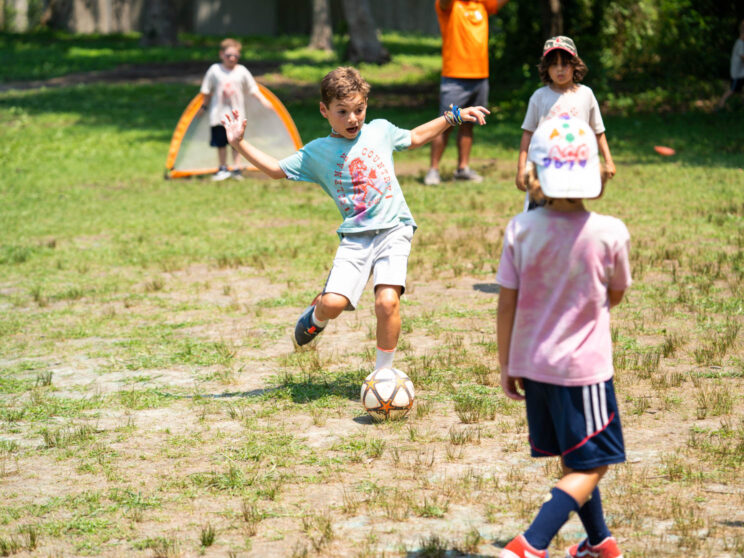 Campers playing soccer.
