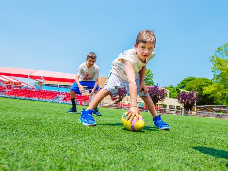 Campers begin football game