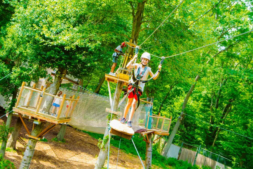 Girl rides Skyak at summer camp