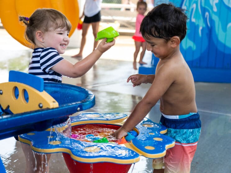 PIT campers playing with water toys.