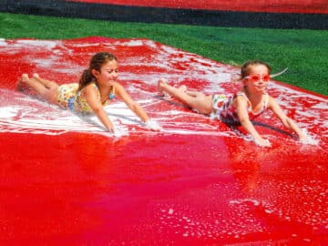 Campers on a slip-n-slide.