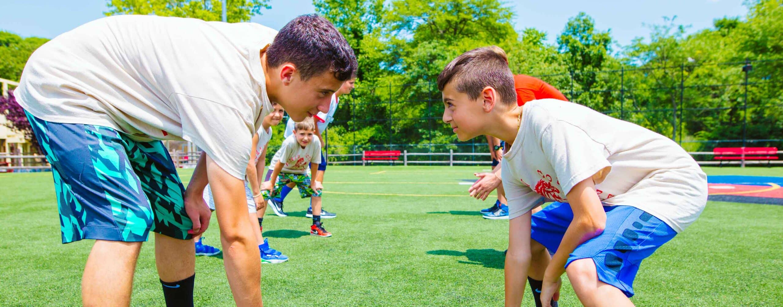 Two campers face off during football game