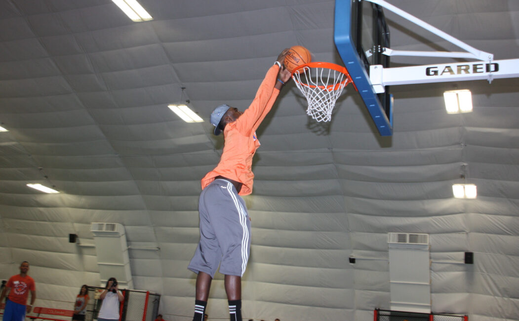 Tim Hardaway Jr dunking a basketball