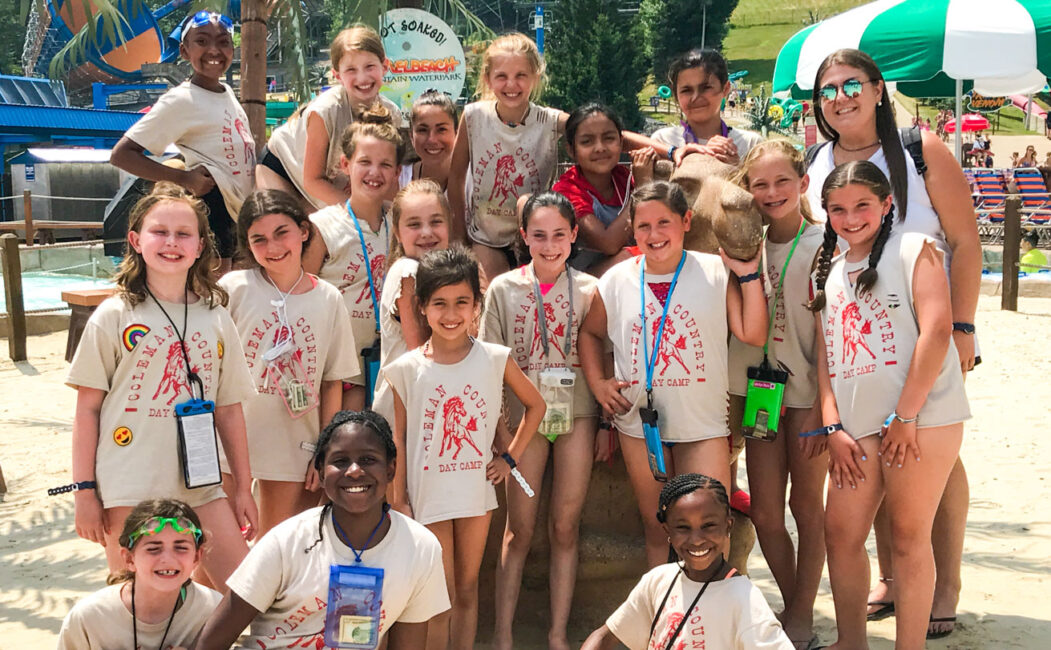 Group of girl campers at the beach