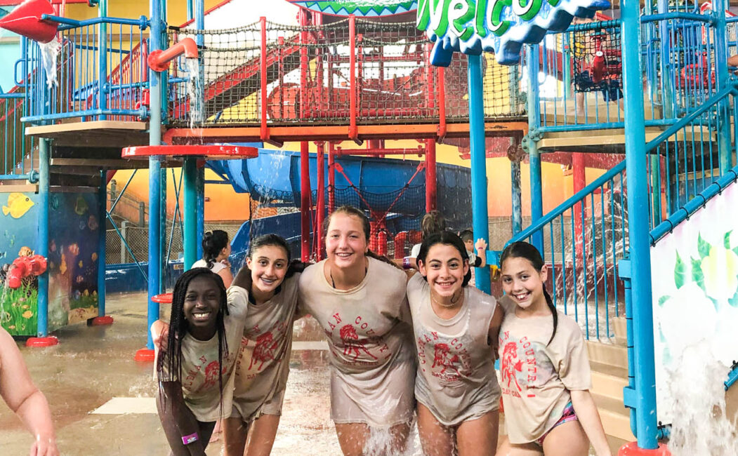 A few girl campers at a water park