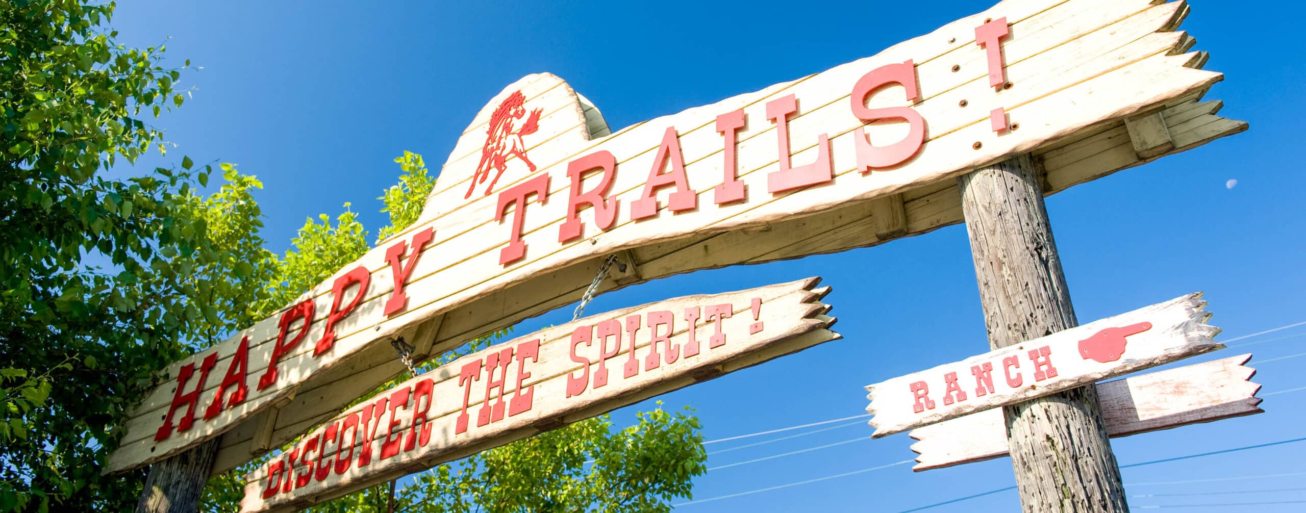 Happy Trails wooden sign.