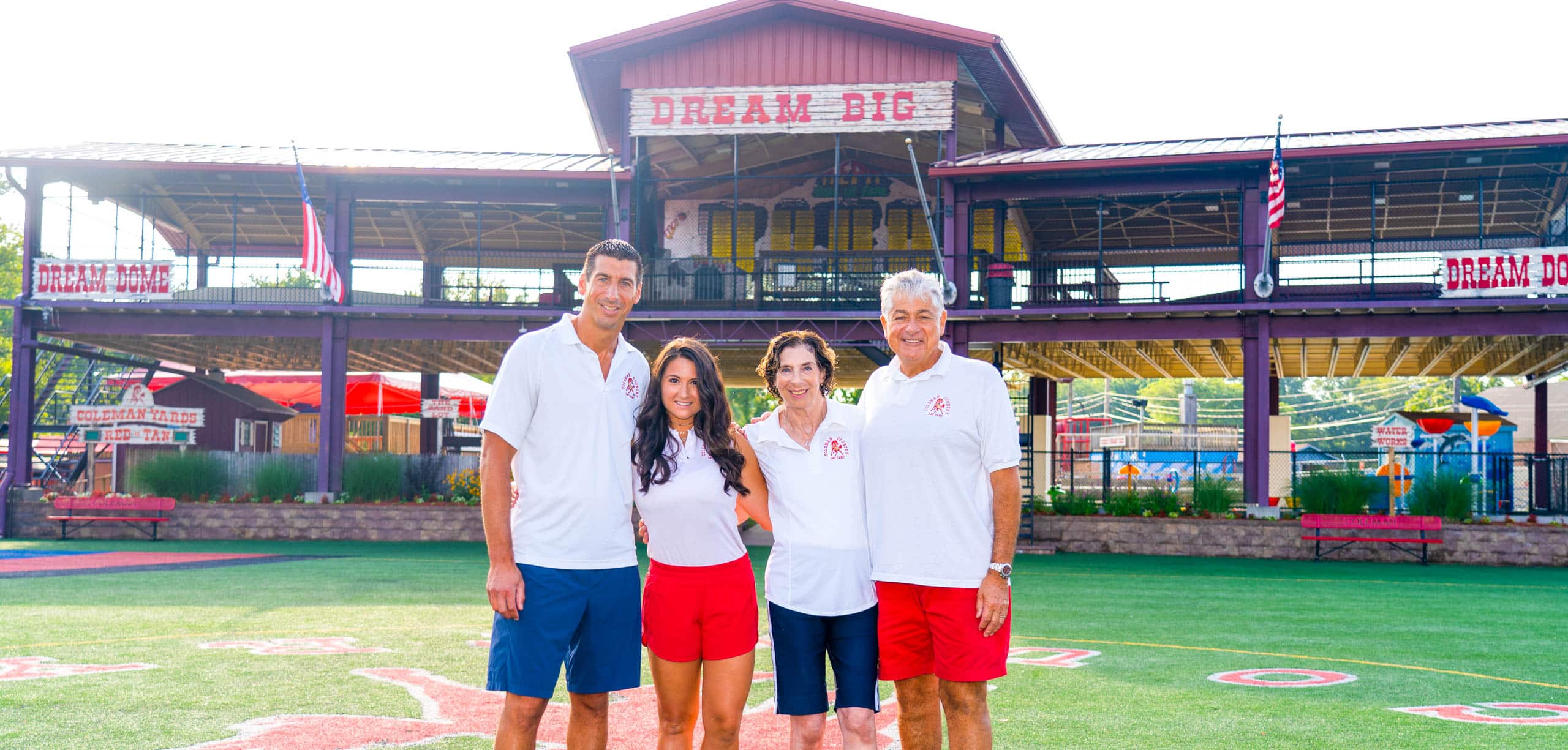 Coleman family stands in front of Dream Dome.